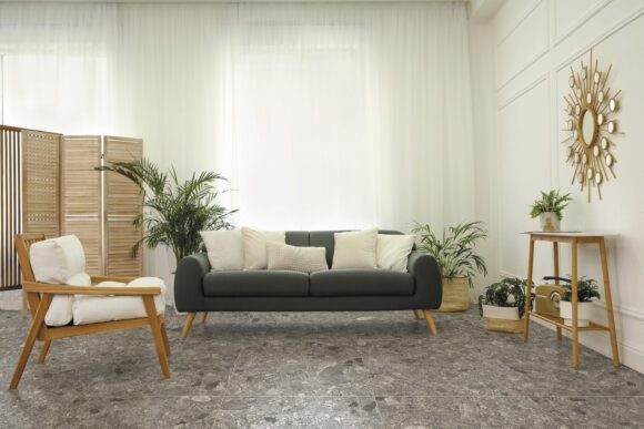 Stylish living room interior with comfortable sofa